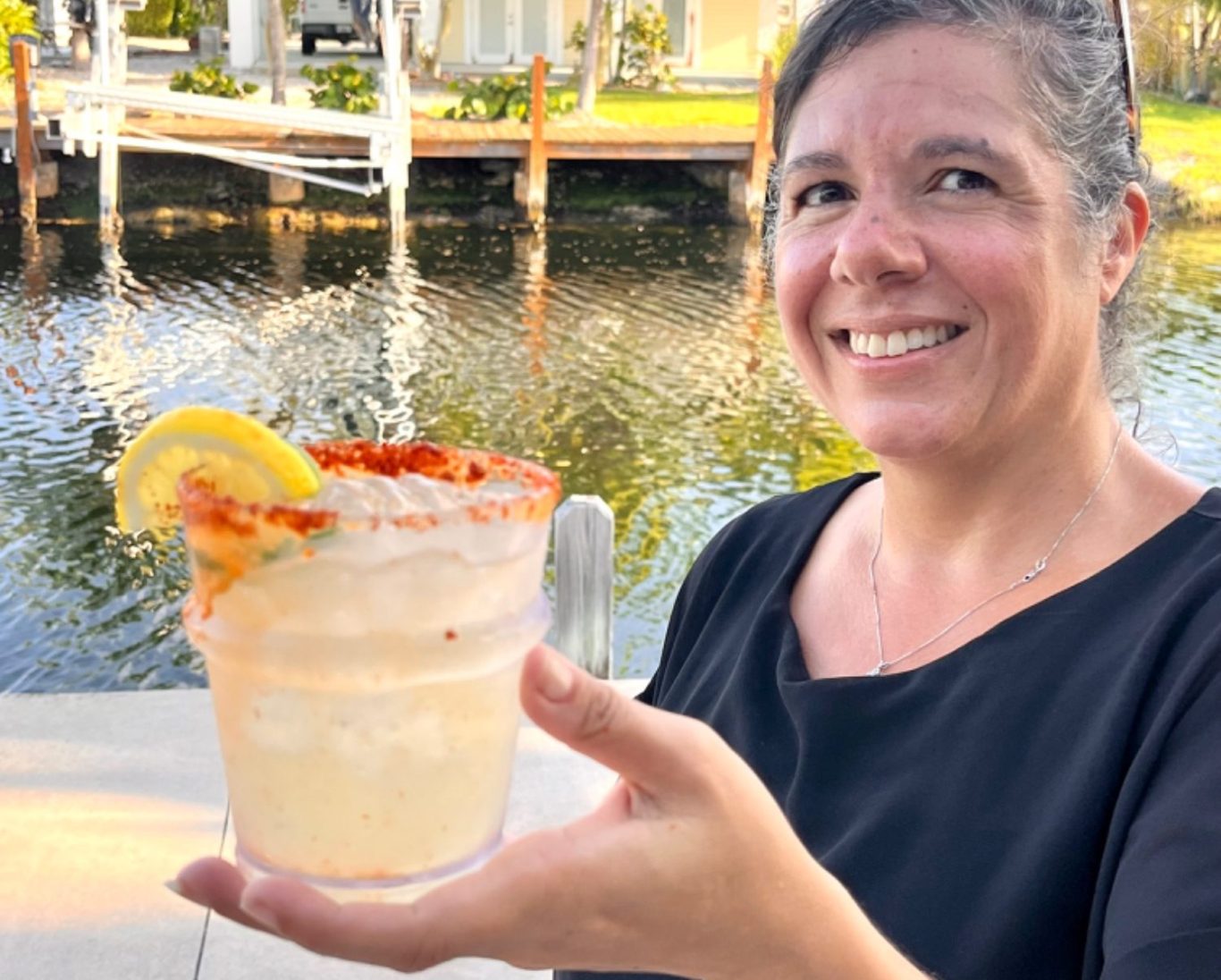 Team Bartender, Signature Cocktail Spicy Margarita with Tajin Clasico for the glass rim for an extra heat.